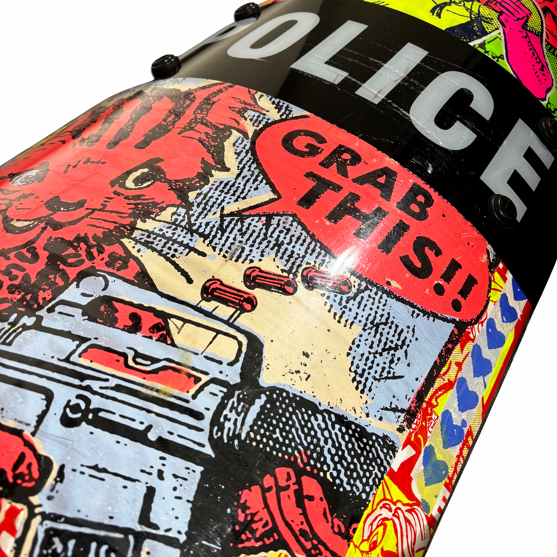Handmade screenprint paste-ups on riot shield by Ben Rider
